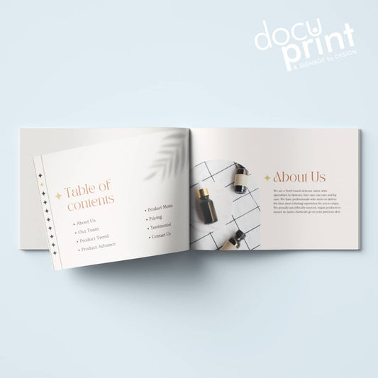 booklet on a blue backdrop. A4 sasddle stitched booklet designed and printed by Docuprint Fremantle, Perth, Australia.