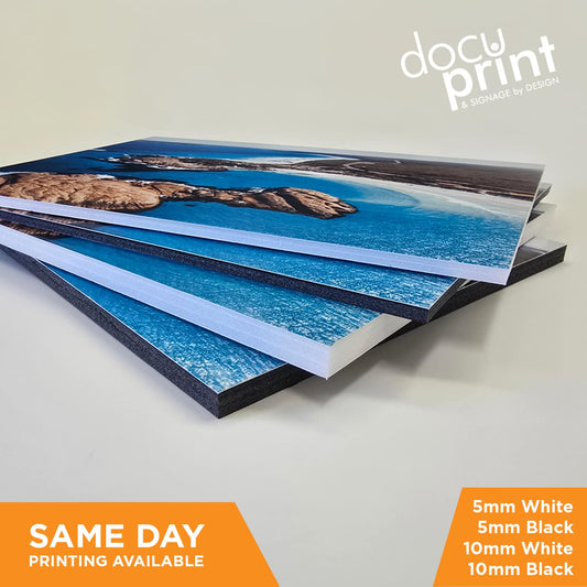 Foamboard mounting of customer supplied poster, ocean and rocky view, side view showing 5mm-10mm thickness, finished by Docuprint in Fremantle, Perth, Australia