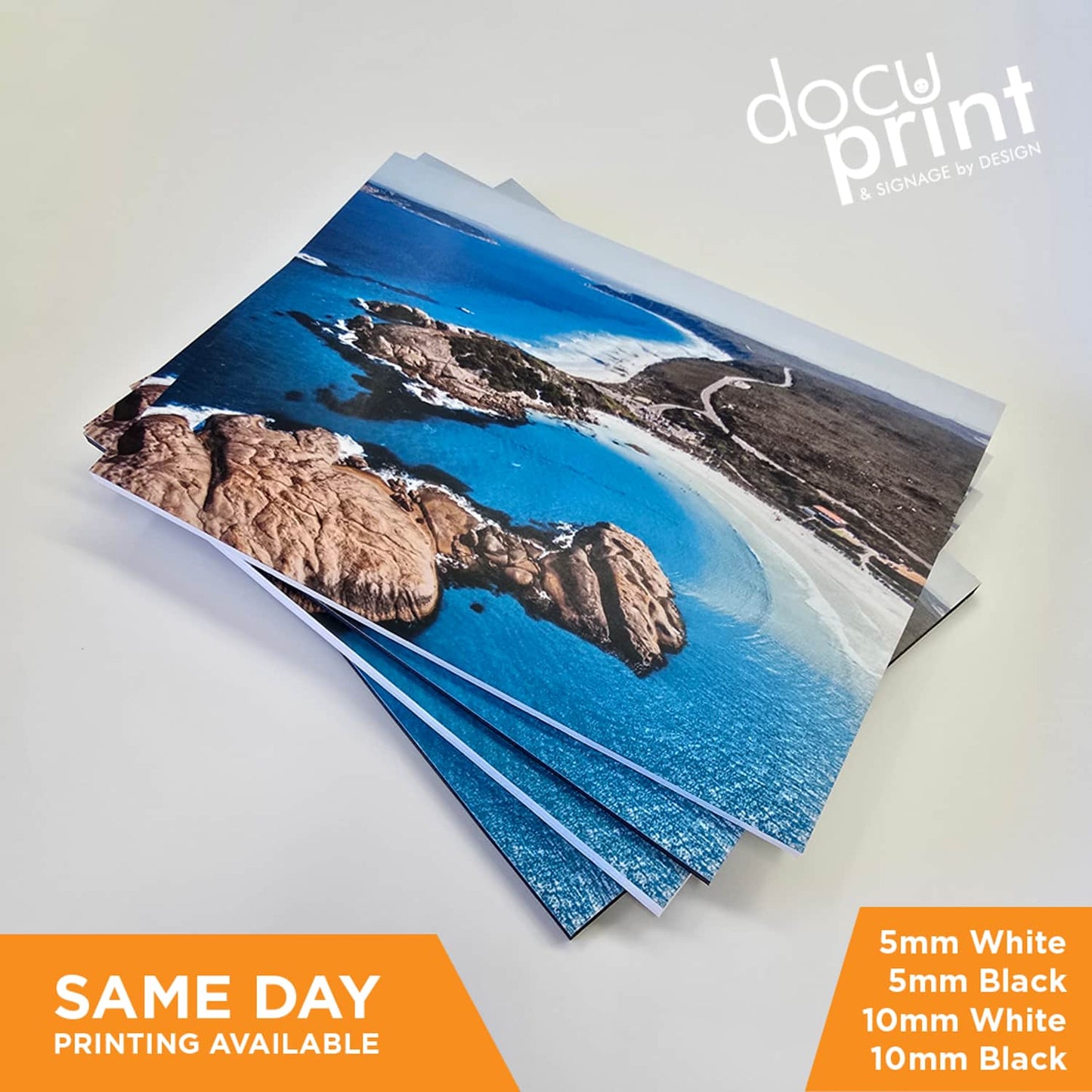 Foamboard mounted customer supplied poster showing scenic ocean and rocks, professionally finished by Docuprint in Fremantle, Perth, Australia