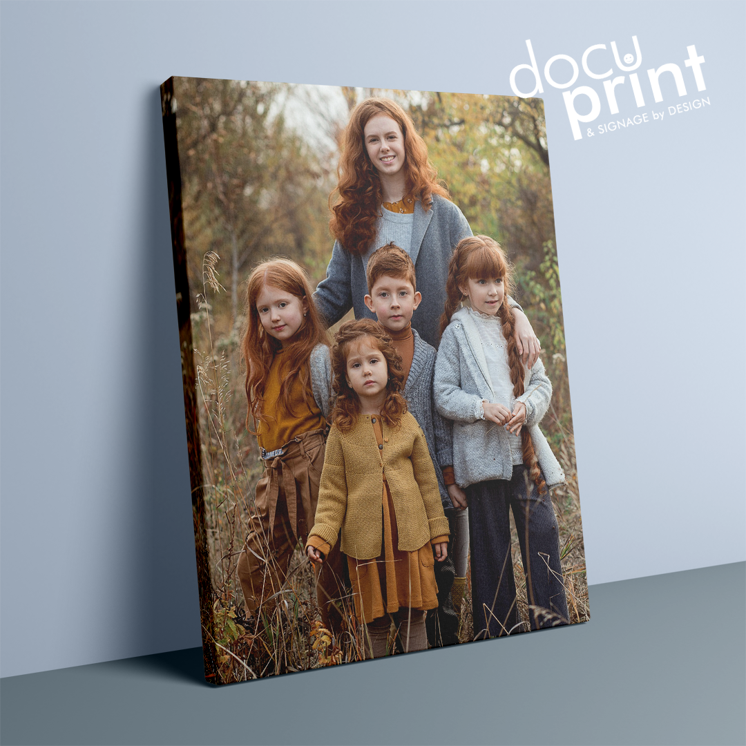 Canvas print photo of a family with four children and one adults in an outdoor autumn setting, custom designed and printed by Docuprint in Fremantle, Perth, Australia