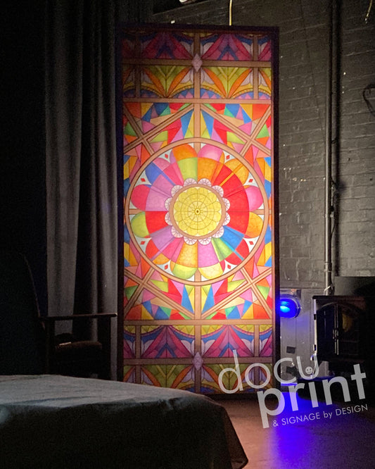 Mock stained glass window decal, featuring colourful patterns, in a tall window of a house, custom designed and printed by Docuprint in Fremantle, Perth, Australia.