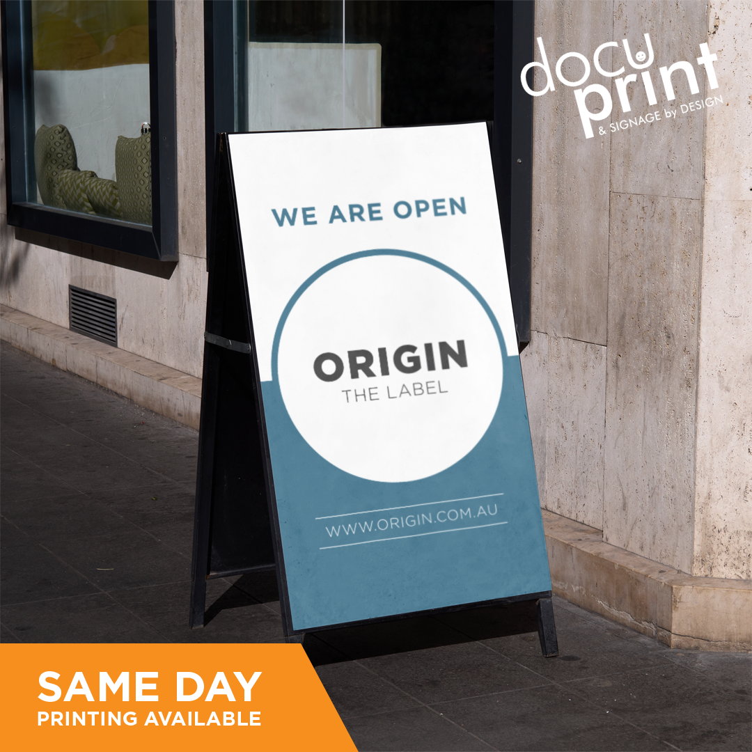 A frame with aluminium panels, saying we are open, custom designed and printed by Docuprint in Fremantle, Perth, Australia. Out the front of a business on the pavement.