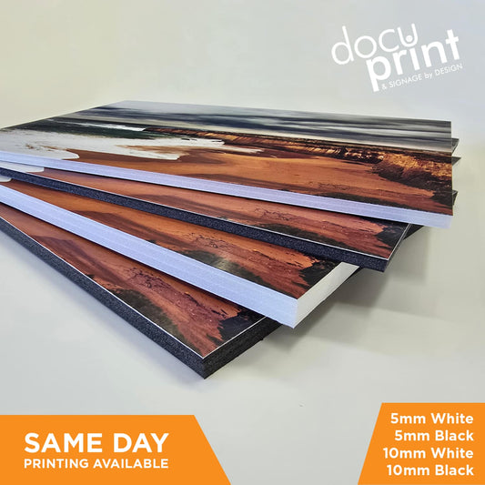Stack of foamboard posters showing 5mm-10mm thickness, professionally printed and finished by Docuprint in Fremantle, Perth, Australia