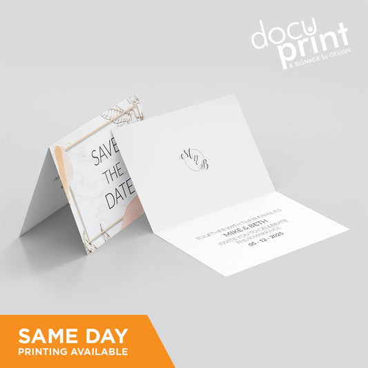 A folded greeting card with an artistic design, featuring text and a logo, predominantly in white and beige tones, custom designed and printed by Docuprint in Fremantle, Perth, Australia