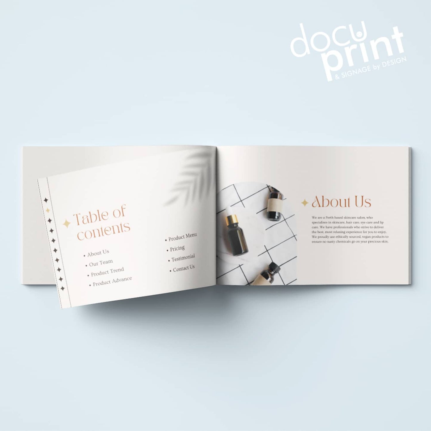 booklet on a blue backdrop. A4 sasddle stitched booklet designed and printed by Docuprint Fremantle, Perth, Australia. 