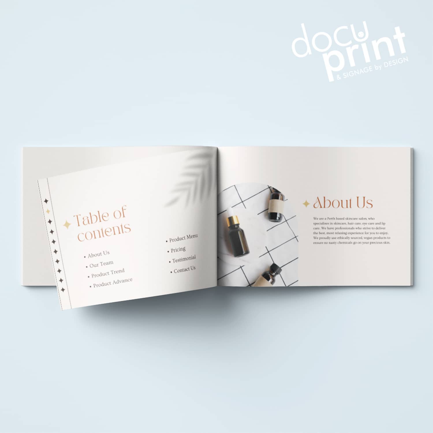 booklet on a blue backdrop. A4 sasddle stitched booklet designed and printed by Docuprint Fremantle, Perth, Australia. 