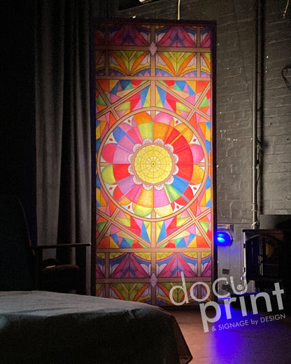 Mock stained glass window decal, featuring colourful patterns, in a tall window of a house, custom designed and printed by Docuprint in Fremantle, Perth, Australia. 