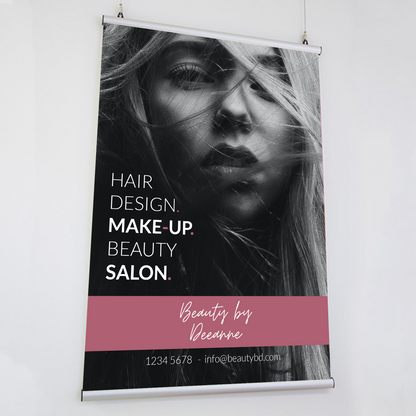 A poster featuring a woman with a close-up on her face, with text that reads 'HAIR DESIGN MAKEUP BEAUTY SALON'. It has a sleek, modern design, and is meant to hold a poster clip hanger, custom designed and printed by Docuprint in Fremantle, Perth, Australia. 
