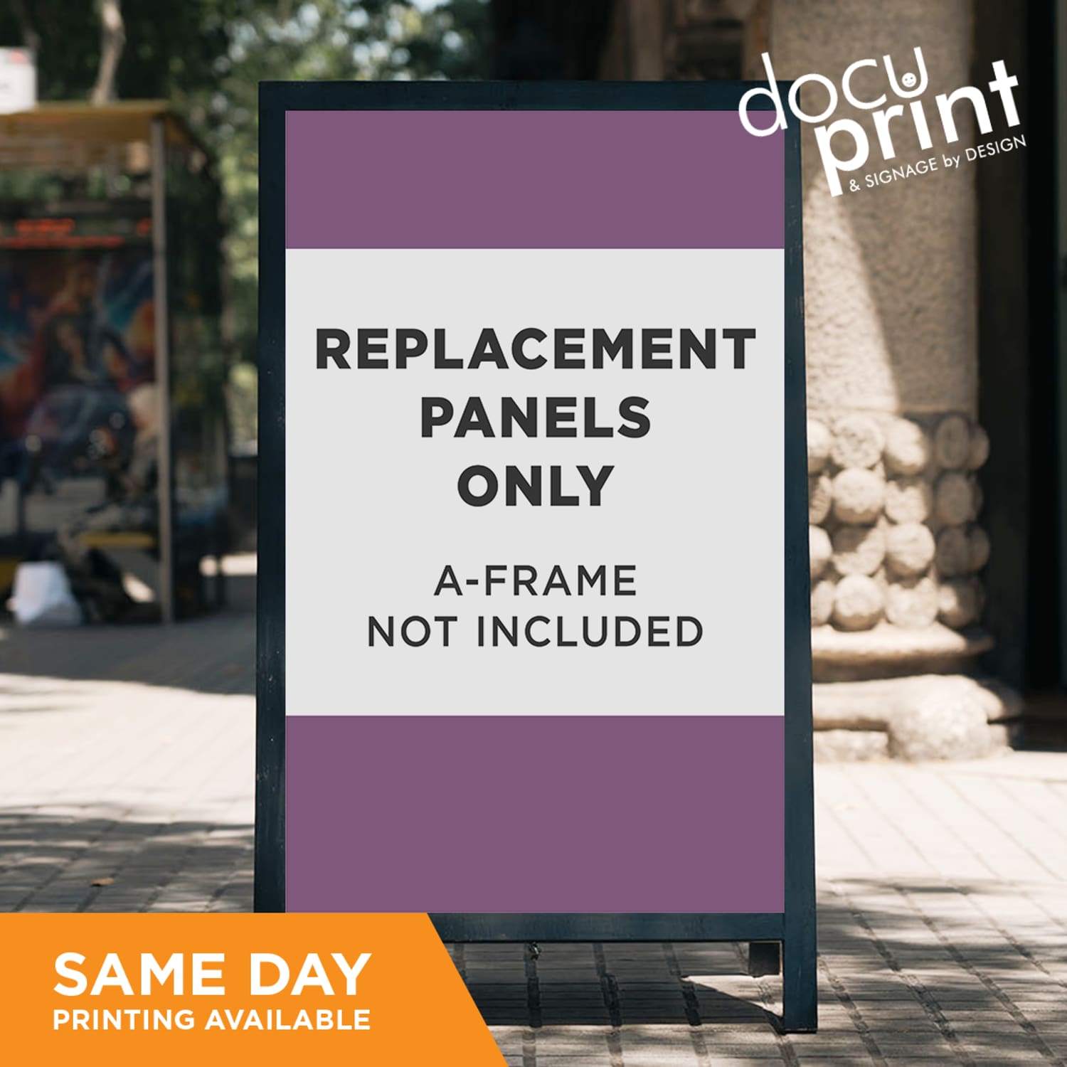 A-frame sign with text 'Replacement Panels Only, A-Frame Not Included' on a street background. Printed and designed at Docuprint fremantle Perth Australia
