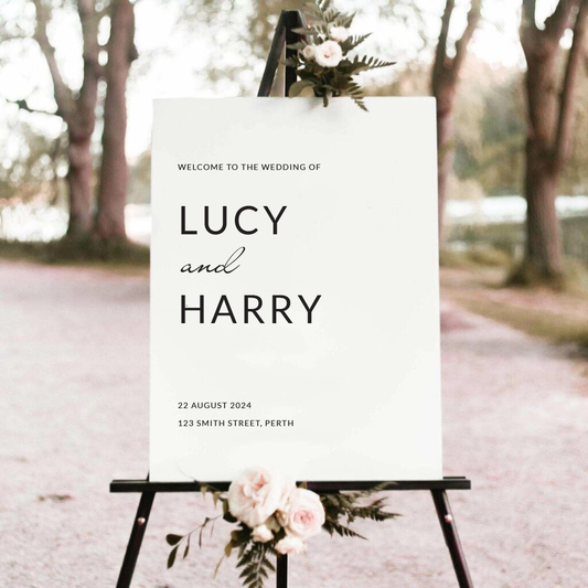 A custom wedding welcome sign with text 'Welcome to the wedding of Lucy and Harry', custom designed and printed by Docuprint in Fremantle, Perth, Australia