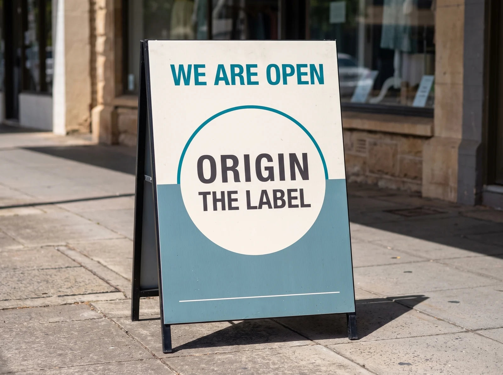 A-frame sign with a fixed printed panel on a shopfront footpath