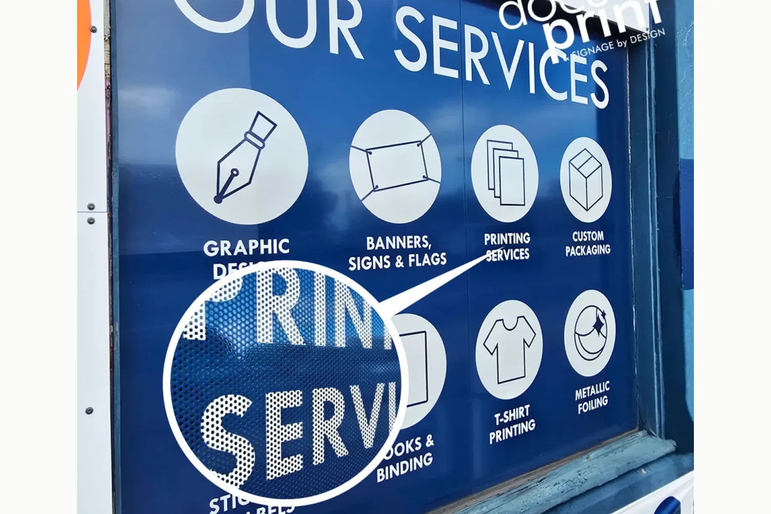 One-way vision window graphic installed on shopfront
